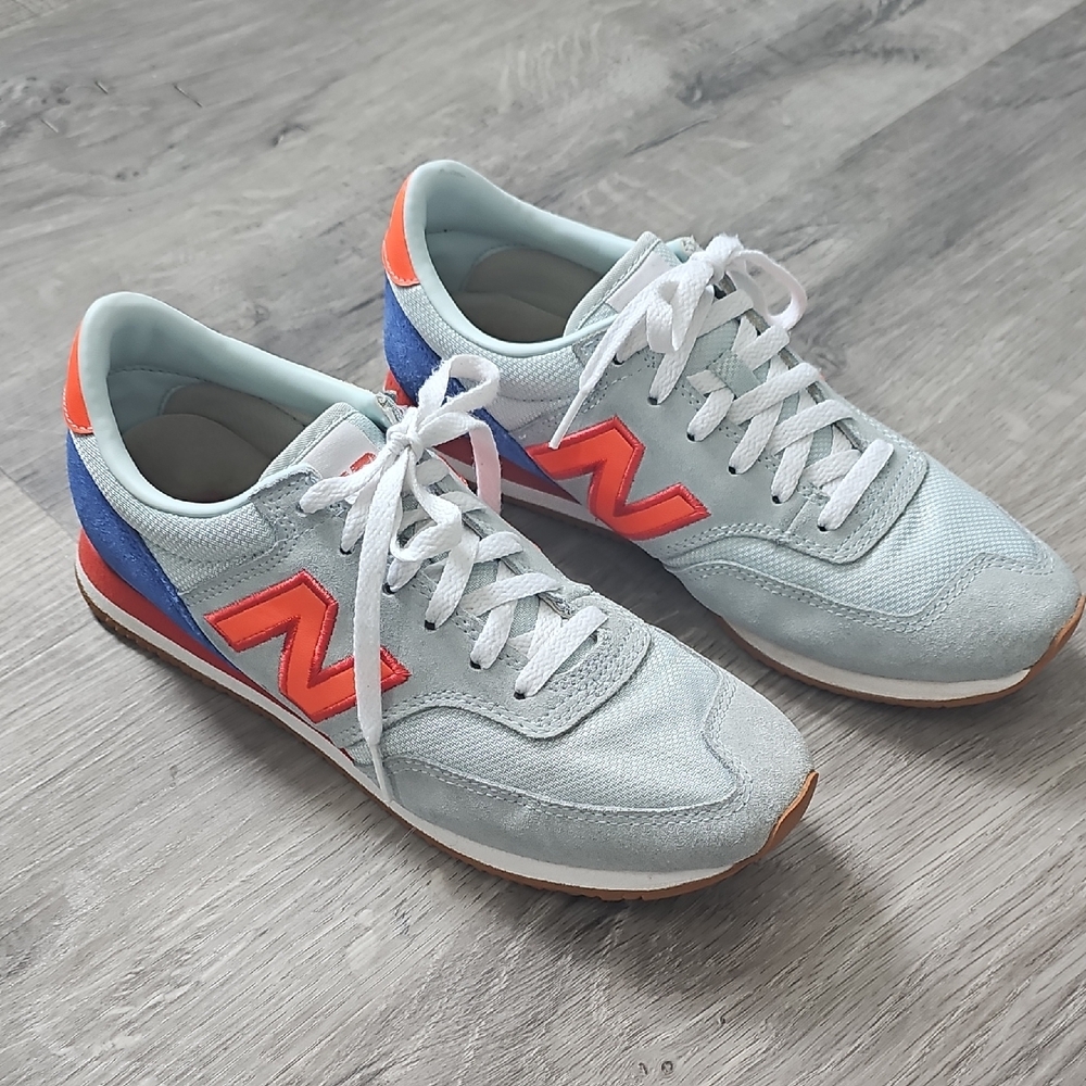 New Balance Retro Light Blue Sneakers with Orange and Blue Accents
